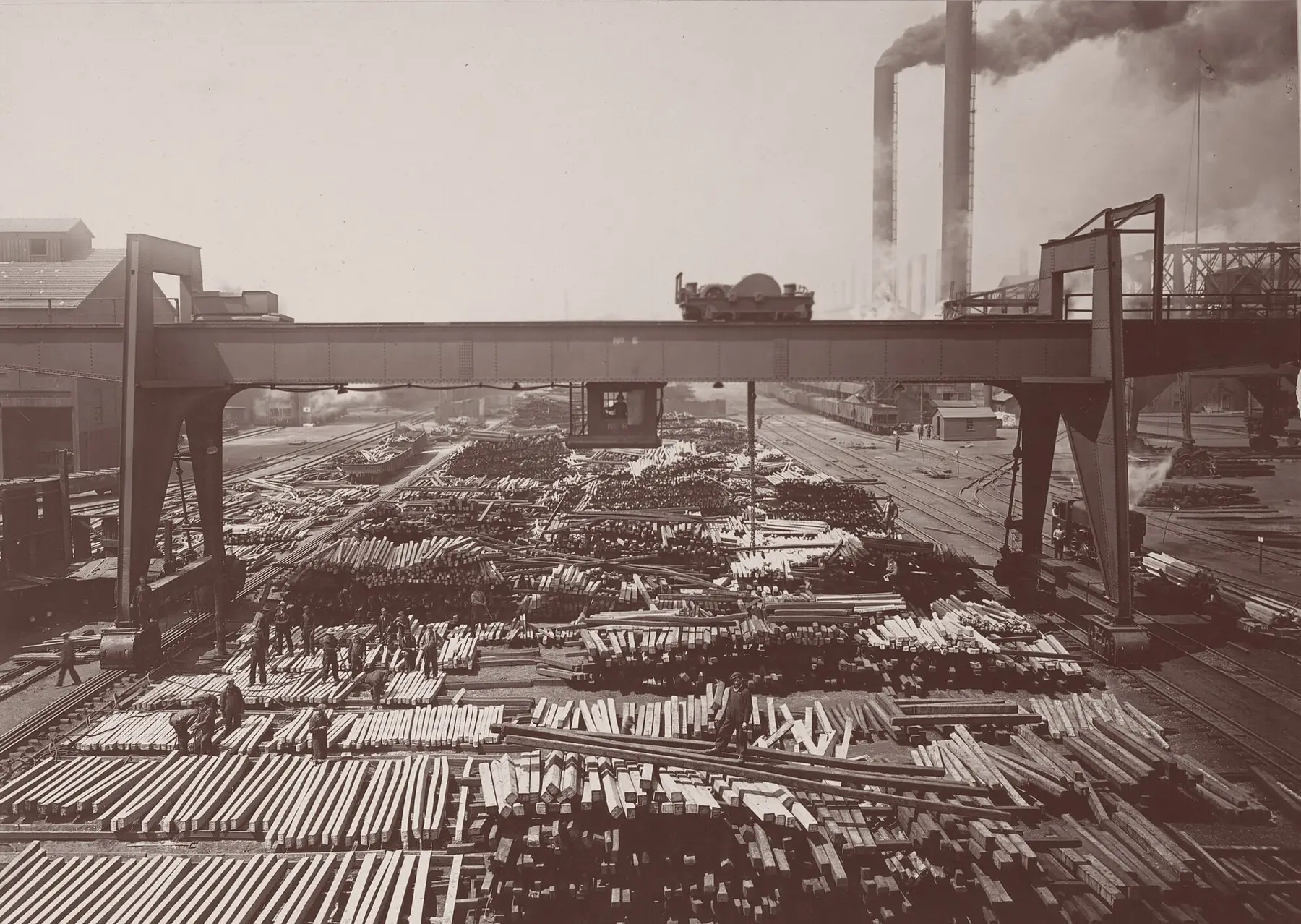 A steel billet yard with an overhead gantry crane, photographed in 1918